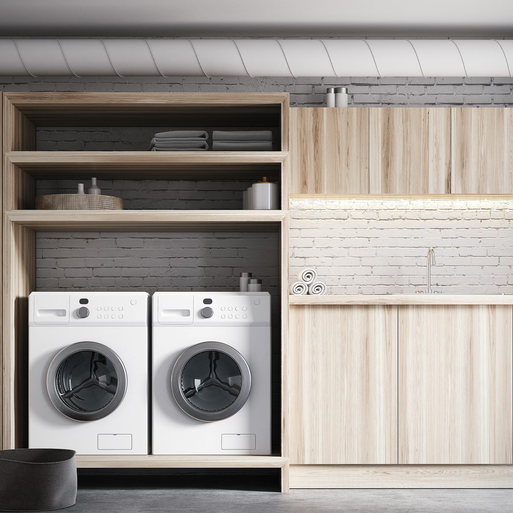 Modern laundry room interior with white brick walls, wooden consoles and shelves with two white washing machines. Close up. 3d rendering