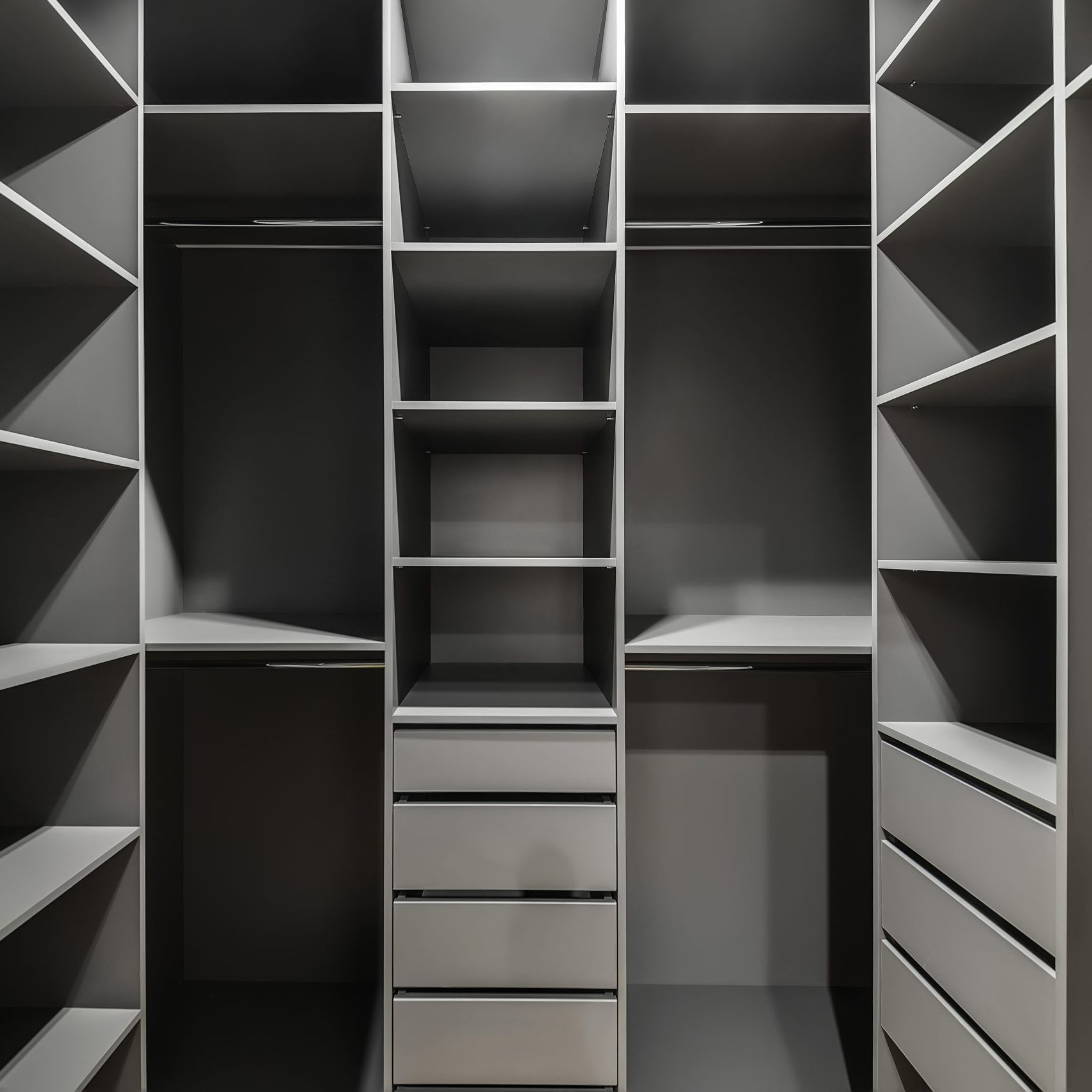 Interior of a modern loft style apartment. Gray wardrobe